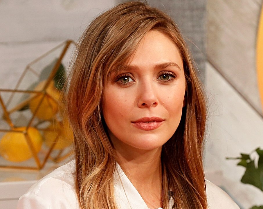 Even Elizabeth Olsen Couldn't Resist Trying Out the Curtain Bangs Trend