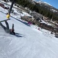 Guy Faceplants To Snow After Sliding On Rails While Snowboarding Down Slope