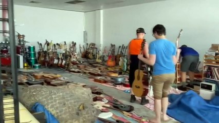 People in Taree on NSW Mid North Coast assess damage