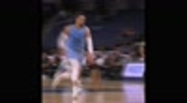 Morant soars to slam home one-handed jam