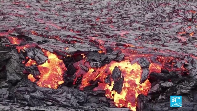 Erupting volcano draws scientists and sightseers