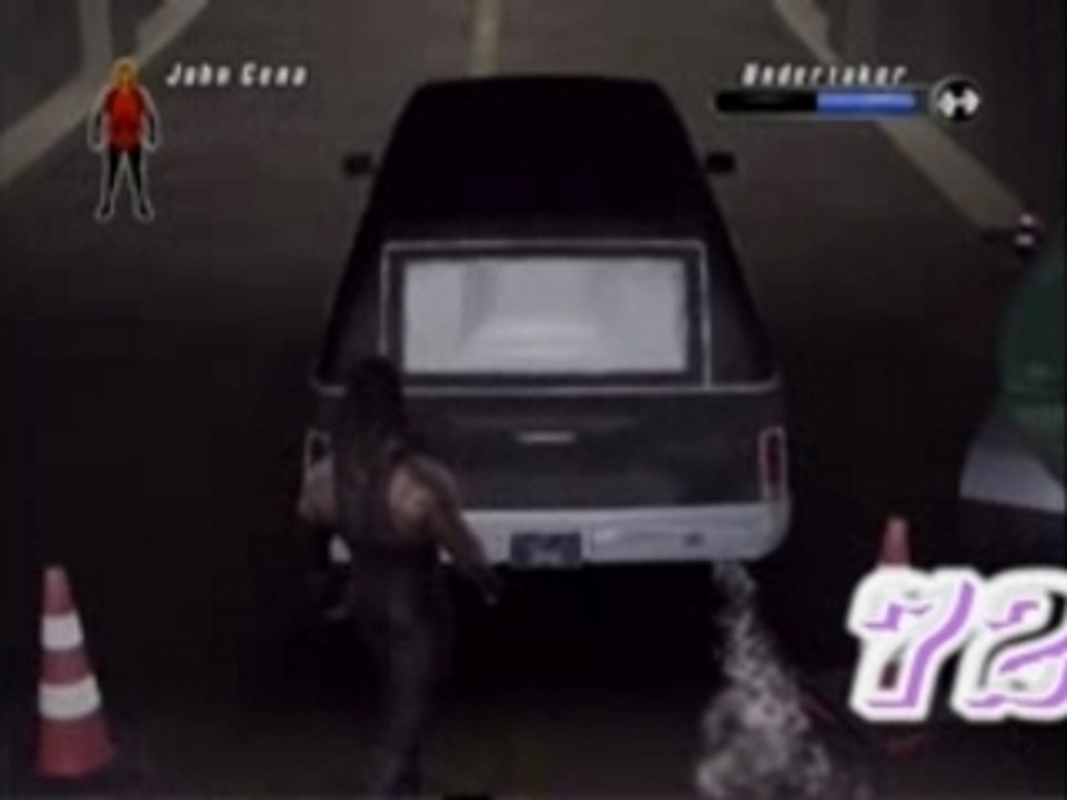 Undertaker met Cena dans le corbillard (parking match)