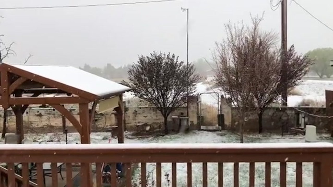 Snow falls across New Mexico