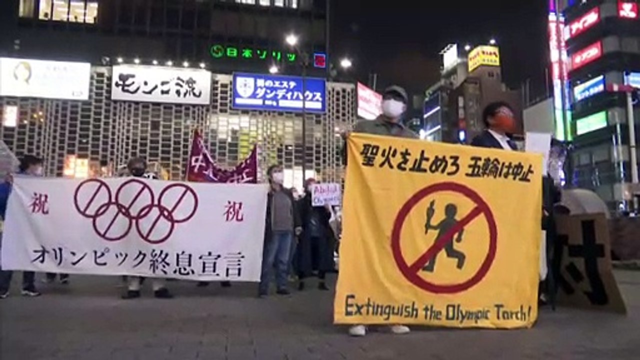 "Stop the Olympics" - Anti-Olympics protesters oppose the games as relay starts