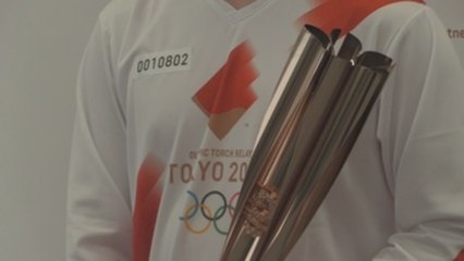 La llama de Tokio 2020 recorre las zonas más afectadas de 2011 en relevo burbuja
