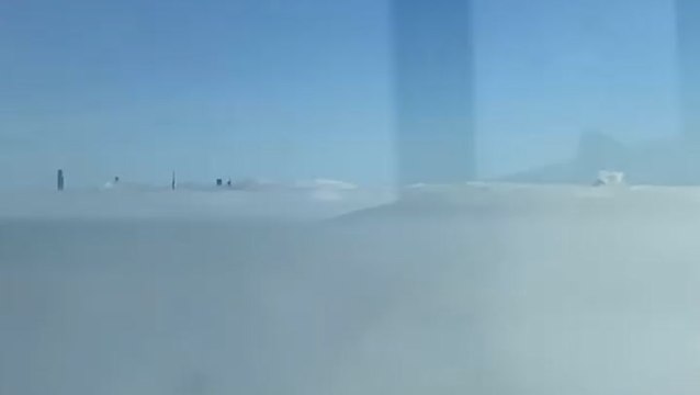 New York skyscrapers peak out from fog