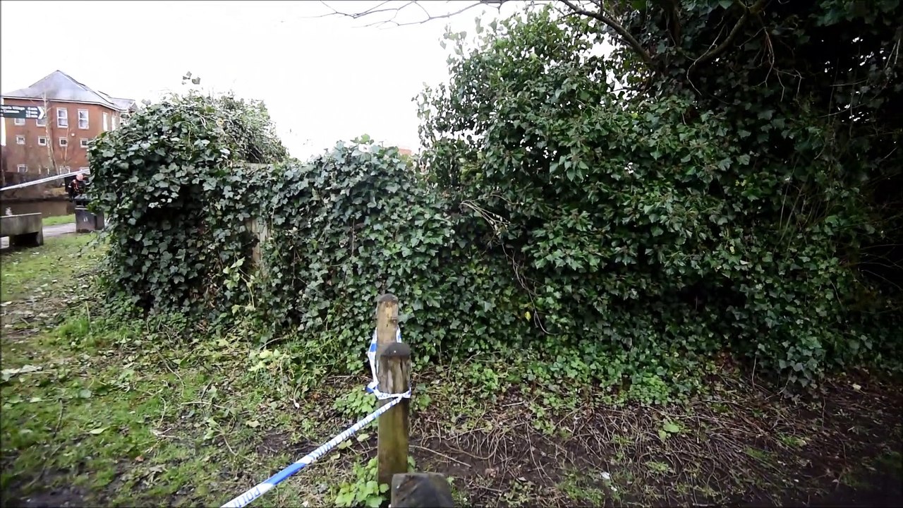 Police at the scene of suspected murder in Leigh