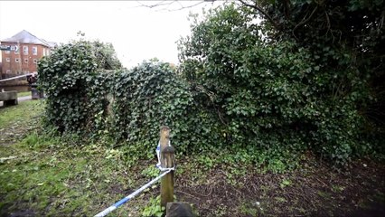 Police at the scene of suspected murder in Leigh