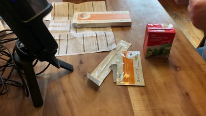 Coronavirus(Covid19)Antigen Schnelltest aus dem Supermarkt/ Experiment Apfelsaft