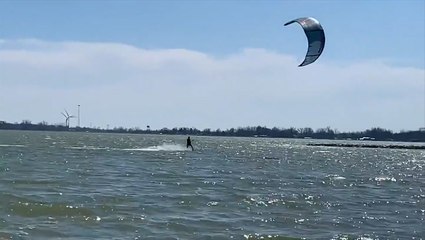 Ohio man uses warm Saturday to catch some air windsurfing