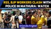 Mathura: A video of a cop being thrashed by BJP and RSS workers goes viral  Oneindia News