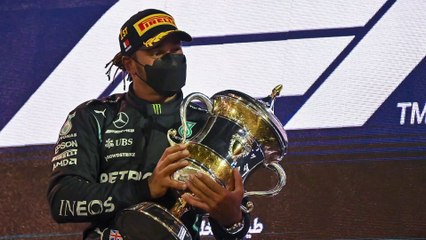 World champion Lewis Hamilton holds off Verstappen to win a tense season-opening Bahrain Grand Prix