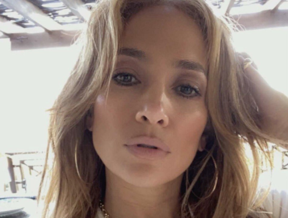 Jennifer Lopez Wore a Tiny Strapless Yellow Bikini to Dance in a Pool