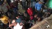 Brigadas intentan rescatar a 11 mineros atrapados por una inundación en Colombia