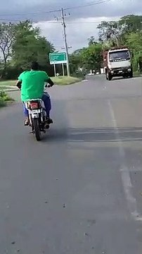 Motorcyclist Attempting Wheelie Wrecks