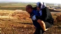 Polis yaralı Suriyeliyi 2 kilometre sırtında taşıdı