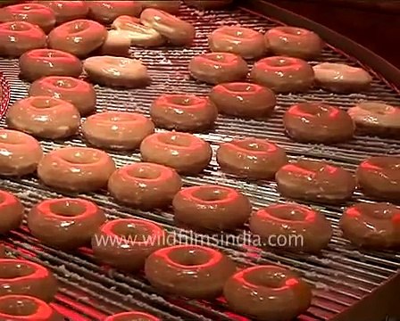 Pizza tosser at Harrod's and Krispy Kreme doughnuts in London