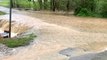 Entire road submerged underwater by flash flooding