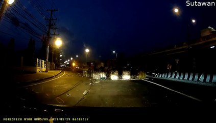 Truck Tips Hay Bales onto Passing Car