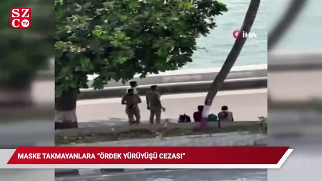 Maske takmayanlara “ördek yürüyüşü” cezası