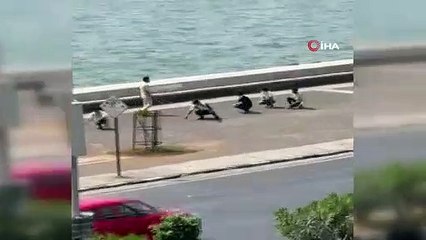 Hindistan'da maske takmayanlara ilginç ceza