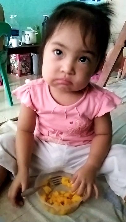 She's Eating Mango