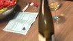Guy Tries To Open Bottle By Flicking Fingers And Ends Up Breaking Wine Glass