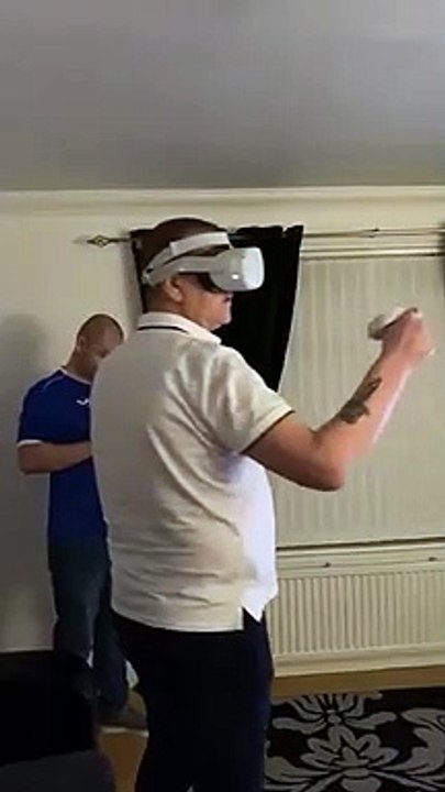 Uncle Trying VR Boxing Ends up with a Broken Lamp and Table