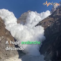 Massive avalanche cascades down Nepal mountain