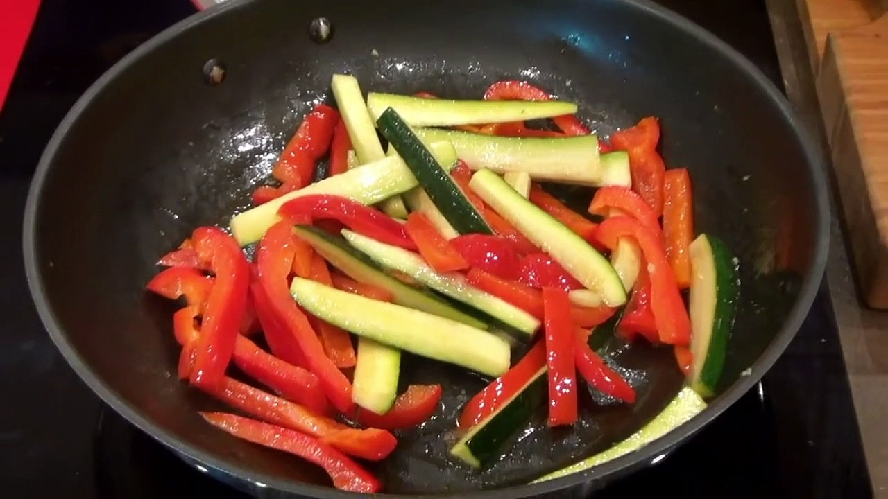Porc sauté aux poivrons et aux courgettes