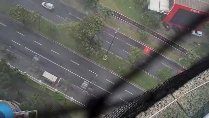 Storm Pushes Water Tank from 24-Story Building