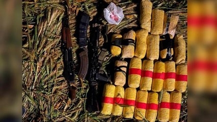 Pak smuggler shot dead, heroin, AK-47 rifles seized