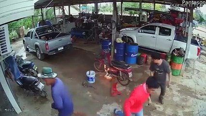 Motorcycle Bursts Into Flames in Mechanic Shop