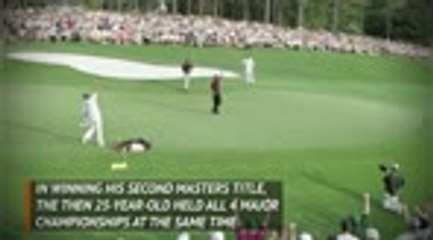 Woods completes the 'Tiger Slam' in 2001