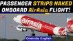 Drunk passenger misbehaves with the AirAsia flight crew, does the most unexpected | Oneindia News