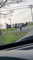 Small Dog Rescued from Car by Kind Neighbors