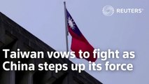 Taiwan vows to fight as China steps up its force