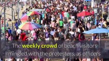 Ahead of ‘white lives’ rally protests begin at Huntington Beach pier