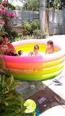 Swimming in the mini pool with my kids