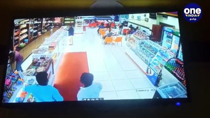 பேக்கரி  கேஷியரை அடித்து  இழுத்துச்செல்லும்  உதவி ஆய்வாளர் கணேஷ் - வைரல் வீடியோ