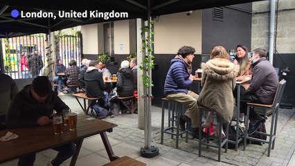 Britons toast to the easing of Covid restrictions