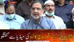 PPP leader Qamar Zaman Kaira talks to media