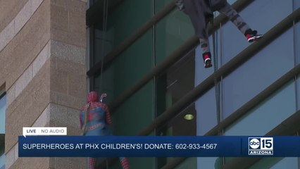 Superheroes lift spirits at Phoenix Children's Hospital