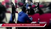 Polisi karşısında gördü, okey oynamaya devam etti