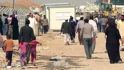 Des déplacés des alentours de Mossoul arrivent au camp de Khazir