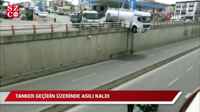 Park halindeyken hareket eden tanker geçidin üzerinde asılı kaldı