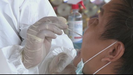 Health centres across Asia struggle with COVID-19 cases
