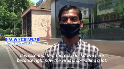 New Delhi residents react as virus lockdown begins