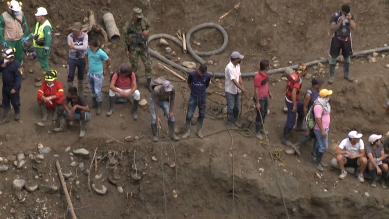 After 22-day search, rescuers find bodies of miners trapped by flooding