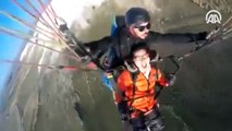 Yamaç paraşütüyle atlayan Çinli turist böyle baygınlık geçirdi